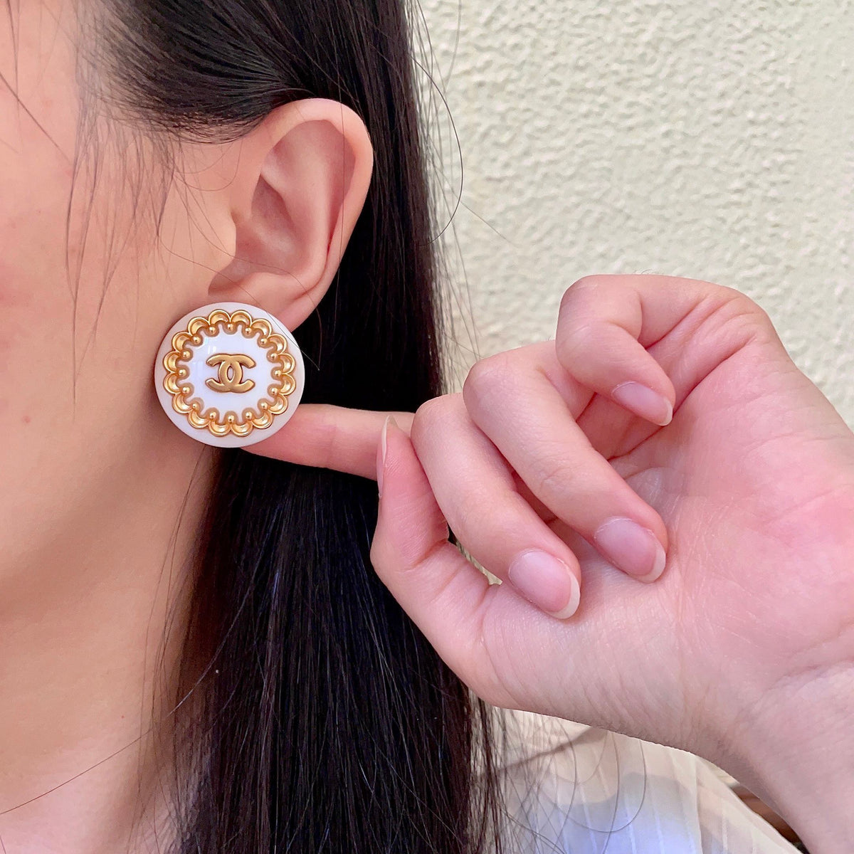 Double-C Emblem Stud Earrings in Polished Metal-Tone – Design 411 front product view