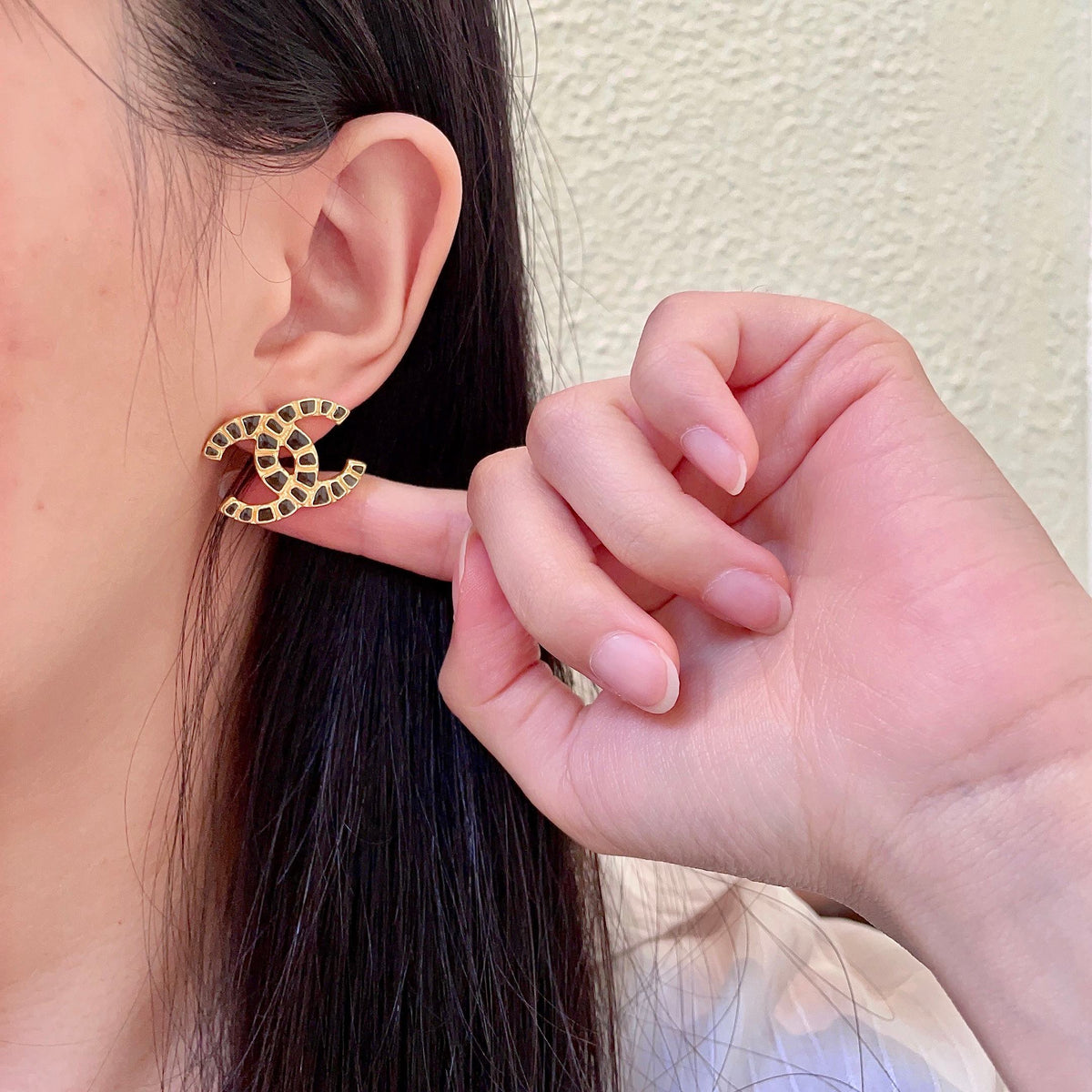 Double-C Emblem Stud Earrings in Polished Metal-Tone – Design 424 front product view