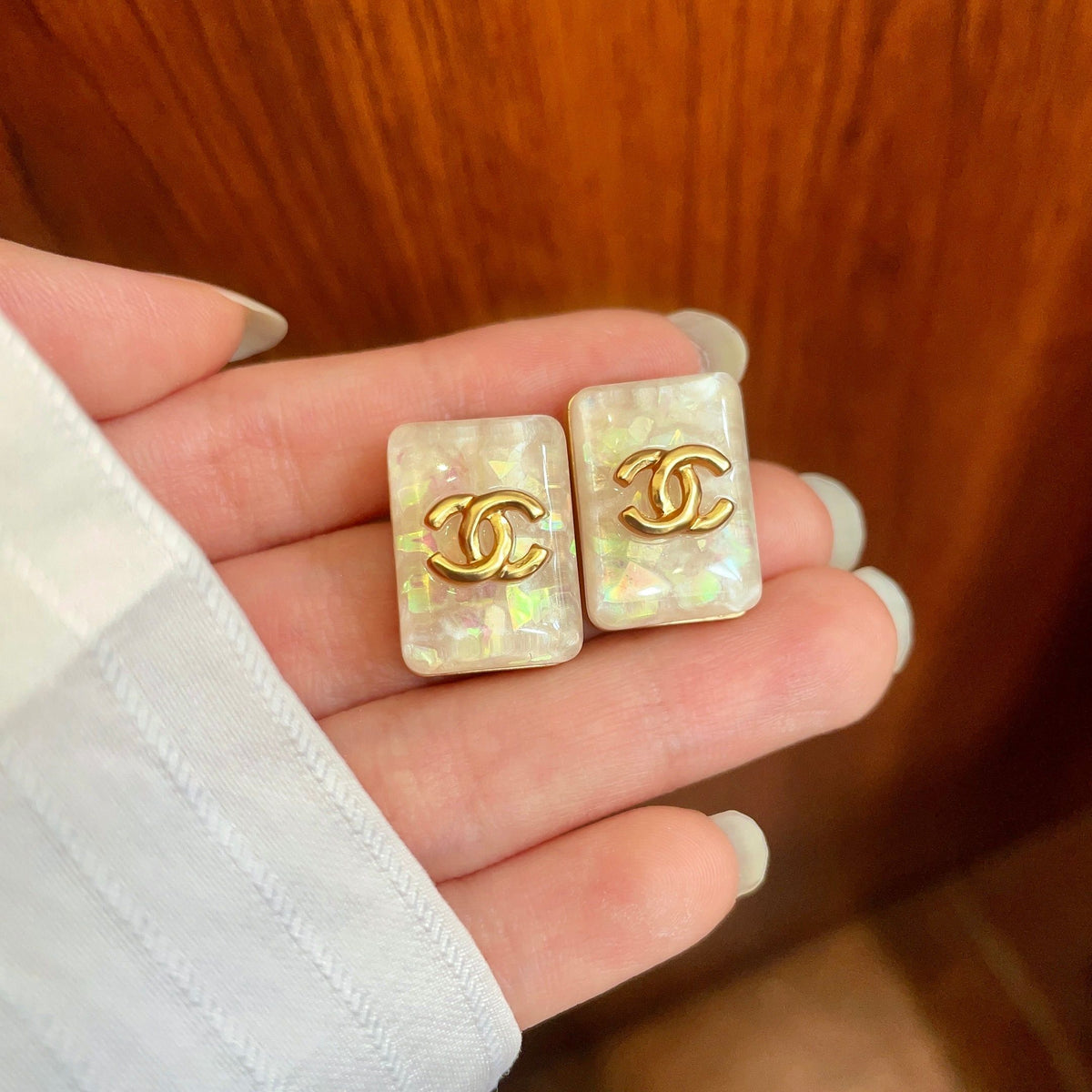 Double-C Emblem Stud Earrings in Polished Metal-Tone – Design 477 side detail