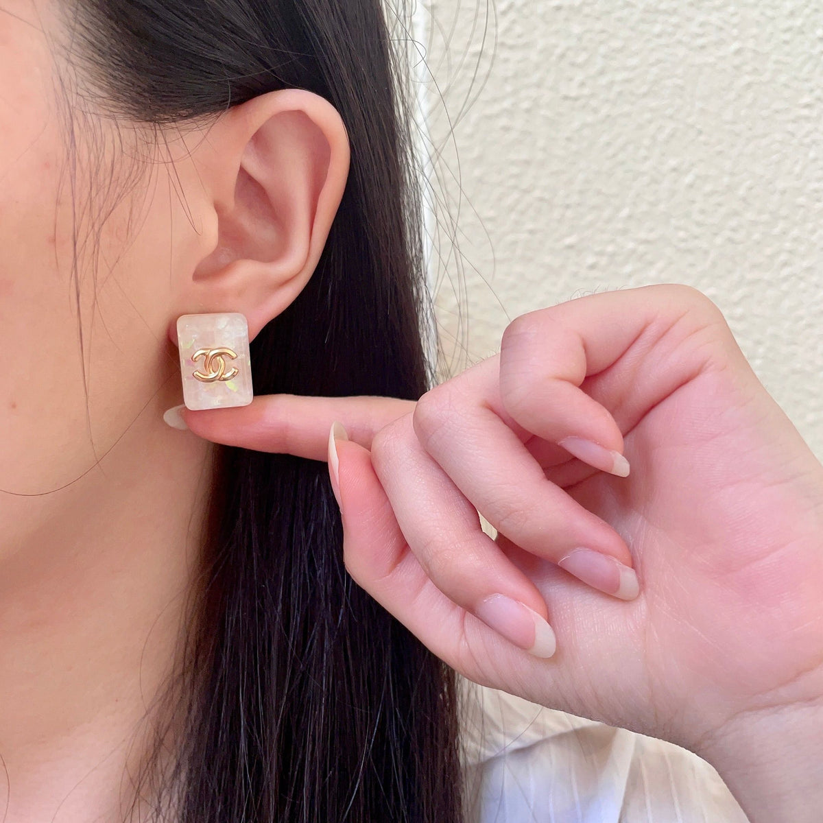 Double-C Emblem Stud Earrings in Polished Metal-Tone – Design 410 front product view