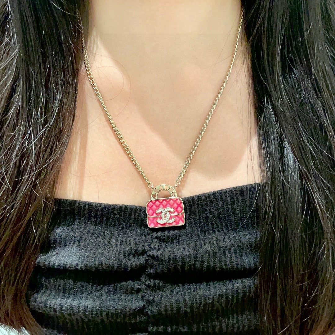 Double-C Emblem Pendant Necklace in Polished Metal-Tone – Design 023 detail view