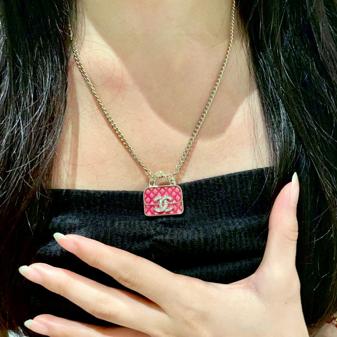 Double-C Emblem Pendant Necklace in Polished Metal-Tone – Design 023 front product view