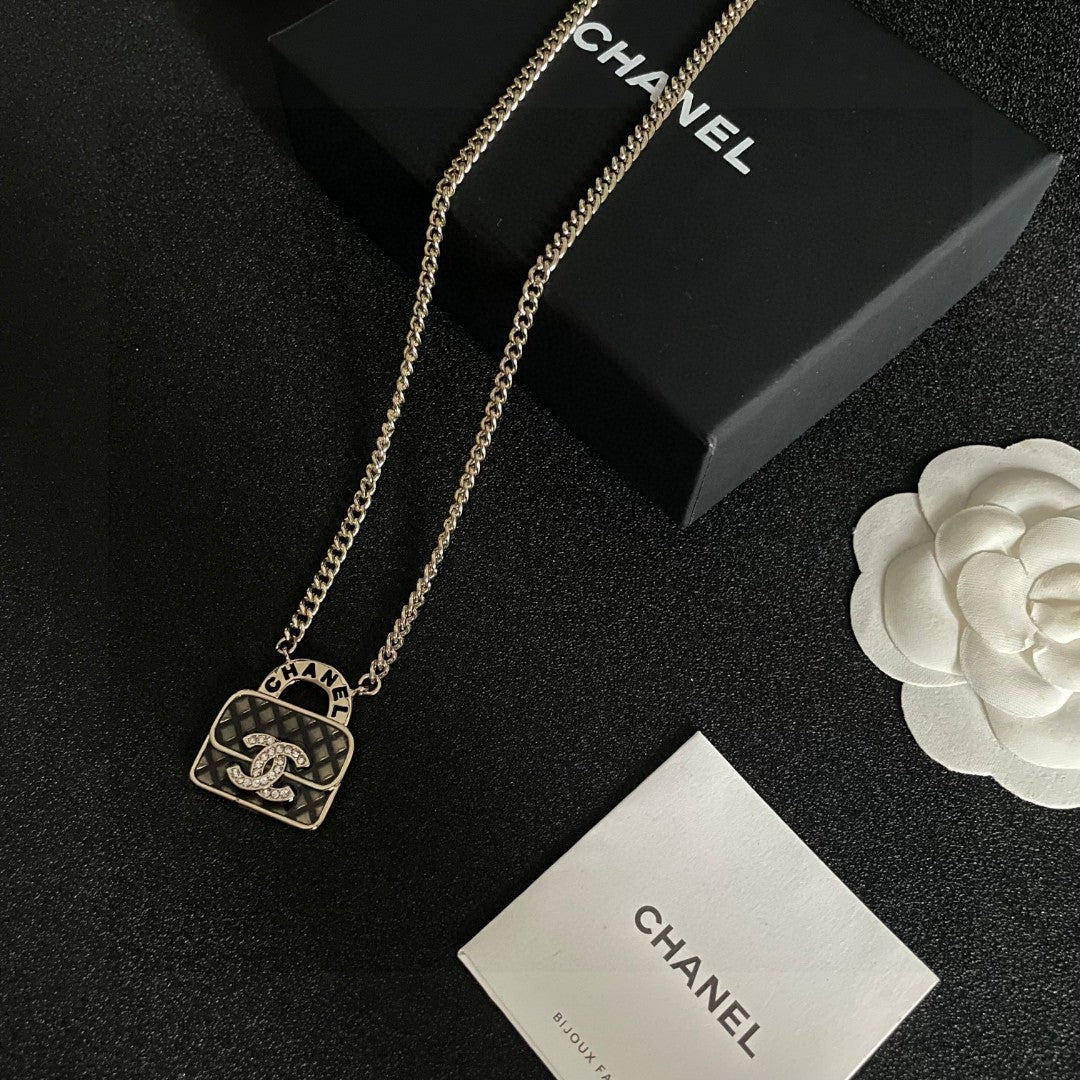Double-C Emblem Pendant Necklace in Polished Metal-Tone – Design 022 close-up detail