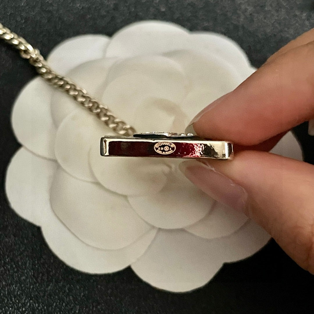 Double-C Emblem Pendant Necklace in Polished Metal-Tone – Design 022 front product view