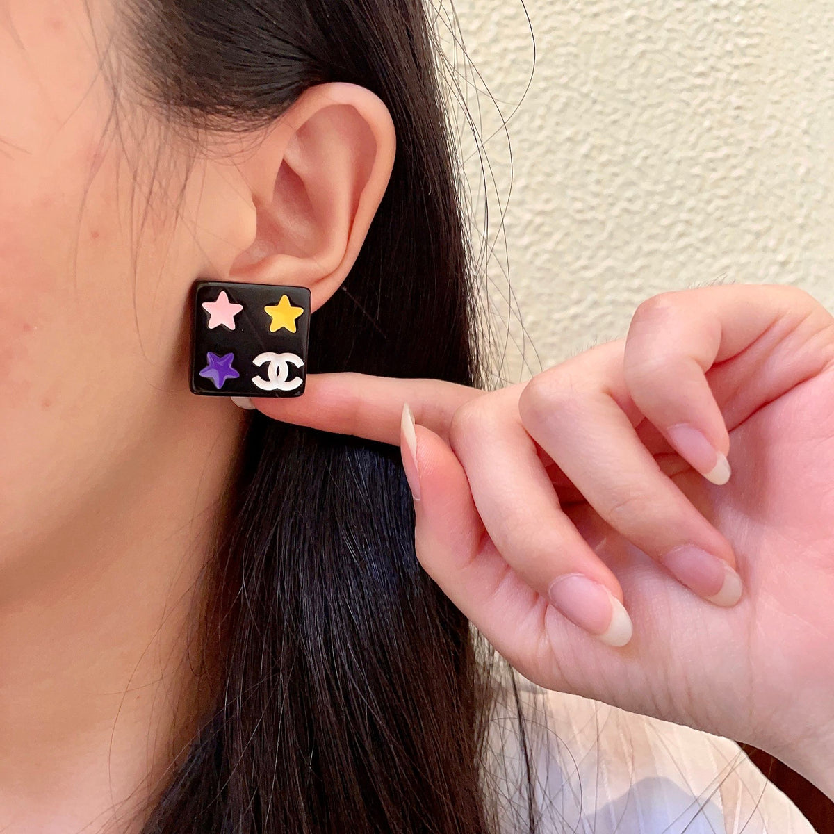 Double-C Emblem Stud Earrings in Polished Metal-Tone – Star Detail – Design 010 front product view
