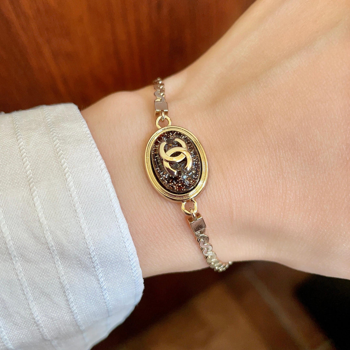 Double-C Emblem Bracelet in Polished Metal-Tone – Design 001 main product view