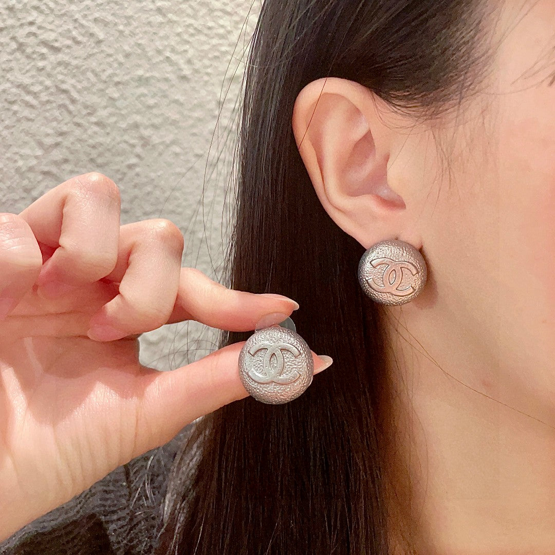 Double-C Emblem Stud Earrings in Polished Metal-Tone – Design 206 main product view