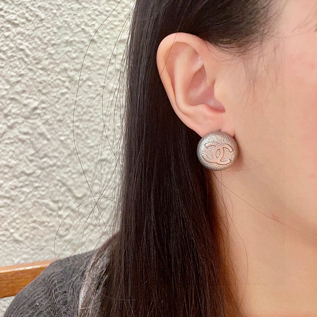 Double-C Emblem Stud Earrings in Polished Metal-Tone – Design 206 detail view