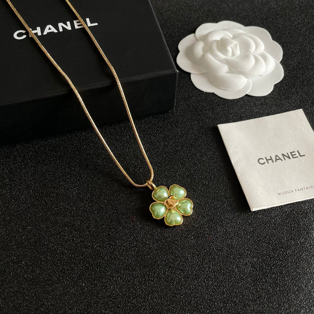 Camellia Pendant Necklace in Polished Metal-Tone – Camellia Detail – Design 015 styled product view
