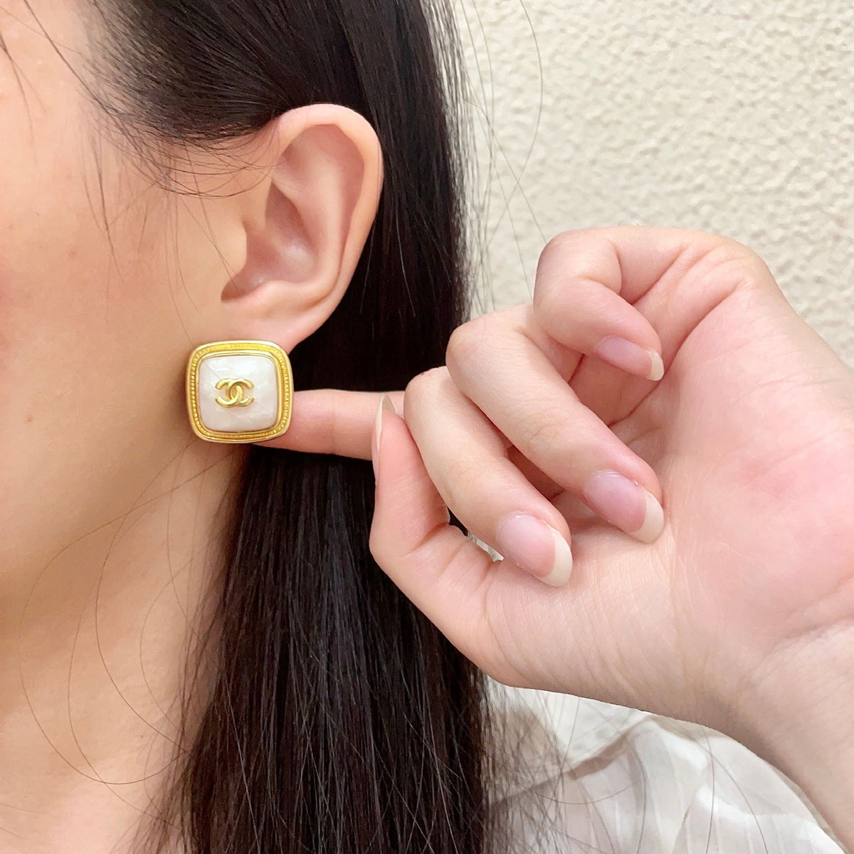 Double-C Emblem Stud Earrings in Polished Metal-Tone – Design 217 front product view