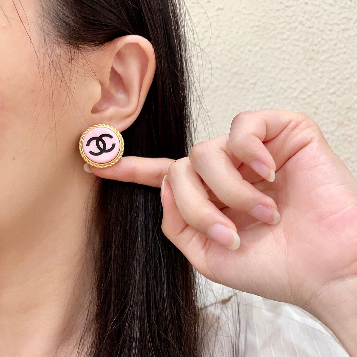 Double-C Emblem Stud Earrings in Polished Metal-Tone – Design 215 front product view