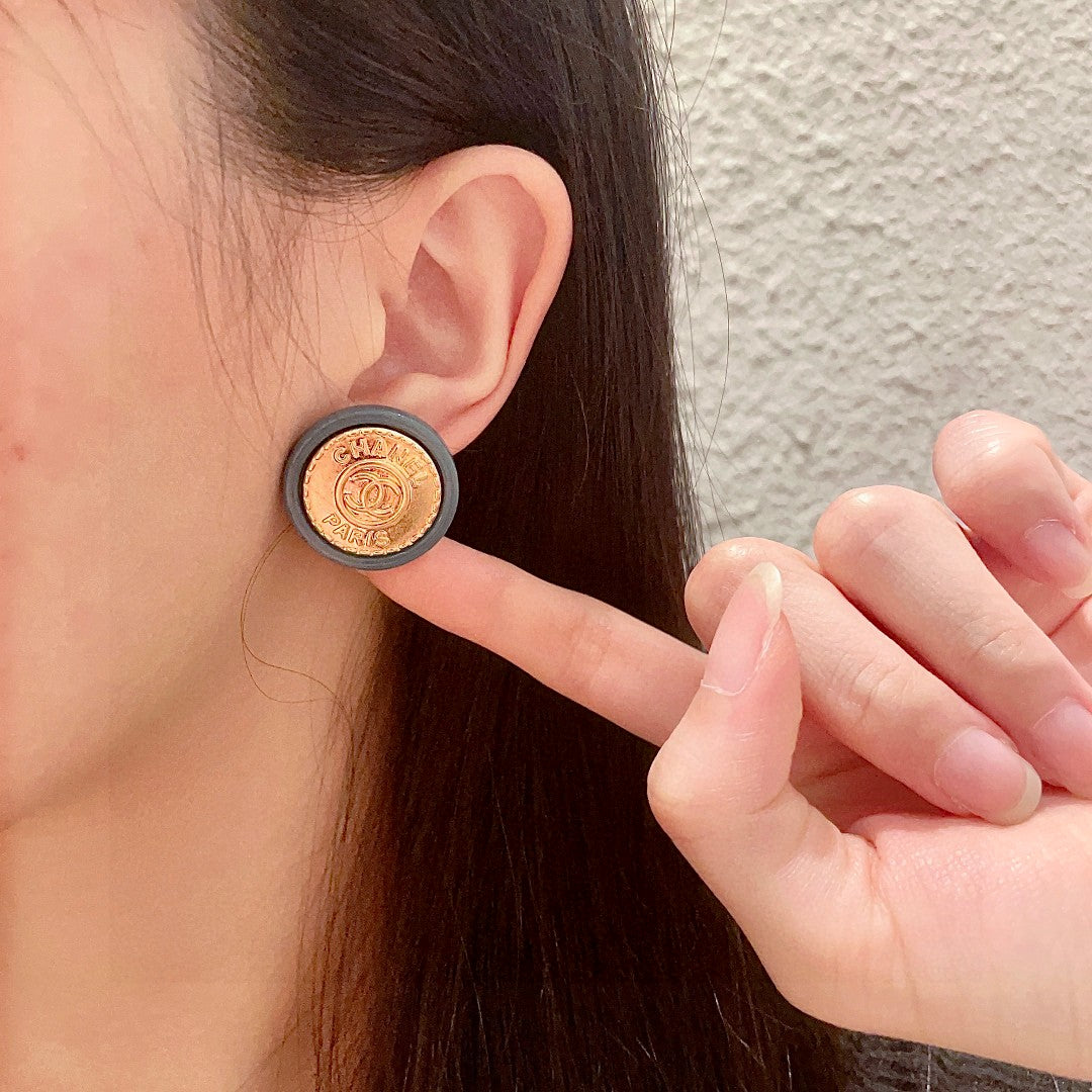 Double-C Emblem Stud Earrings in Polished Metal-Tone – Design 237 front product view