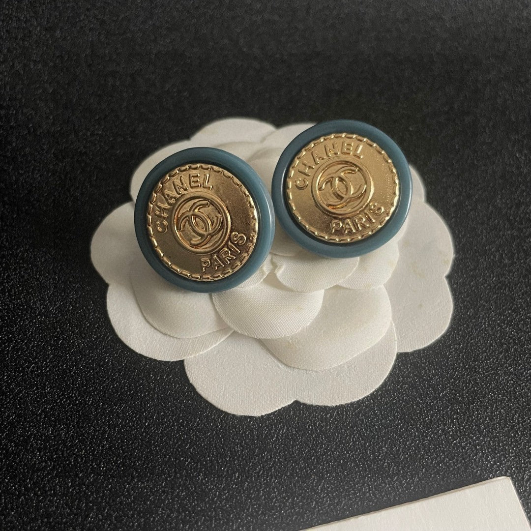 Double-C Emblem Stud Earrings in Polished Metal-Tone – Design 279 front product view