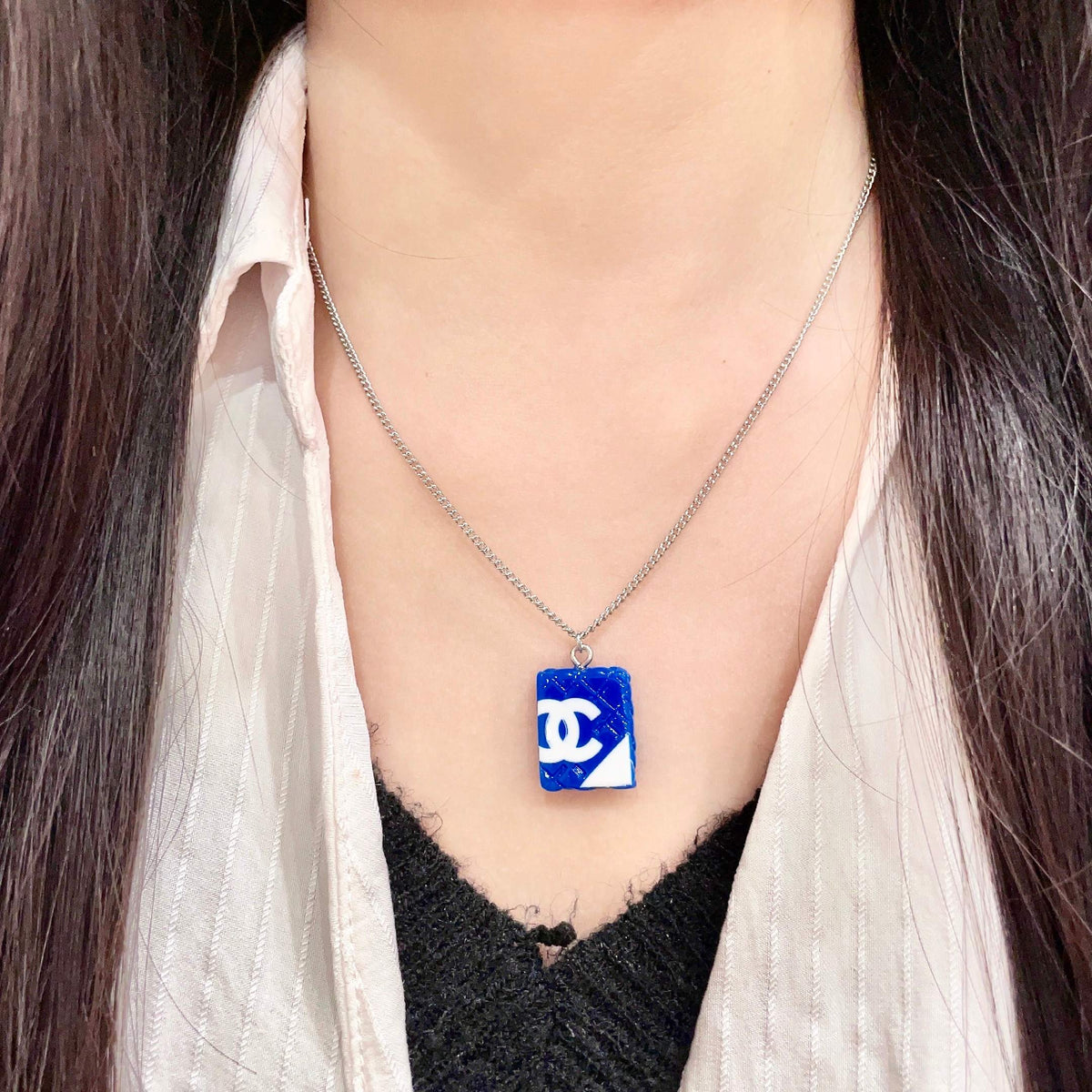 Double-C Emblem Pendant Necklace in Polished Metal-Tone – Design 038 detail view