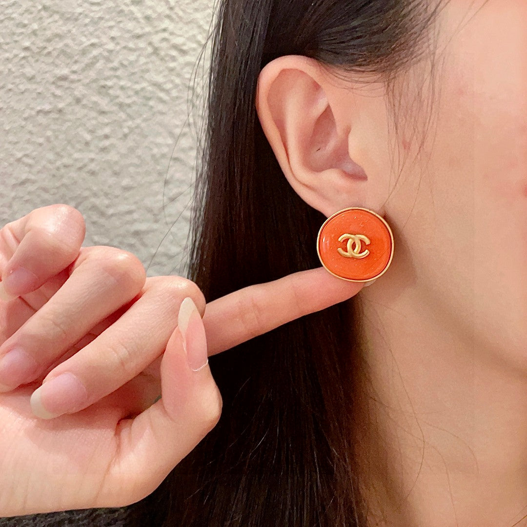 Double-C Emblem Stud Earrings in Polished Metal-Tone – Design 259 front product view