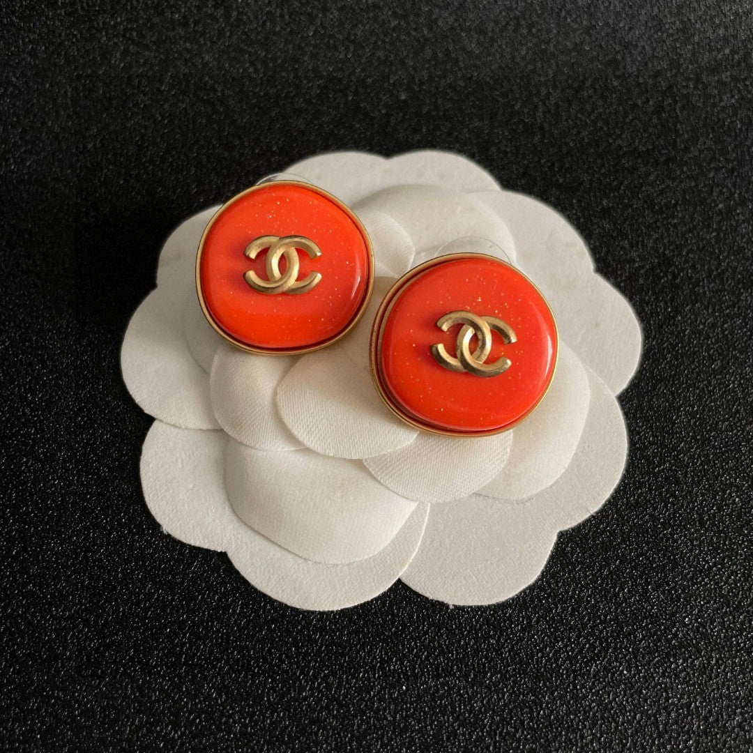 Double-C Emblem Stud Earrings in Polished Metal-Tone – Design 270 front product view