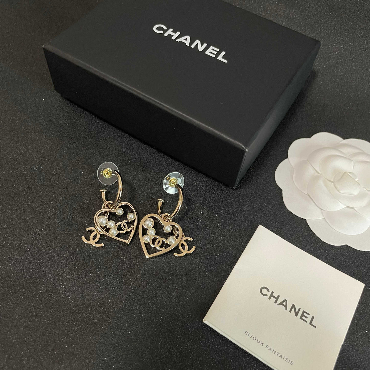 Double-C Emblem Stud Earrings in Polished Metal-Tone – Heart Detail – Design 009 close-up detail