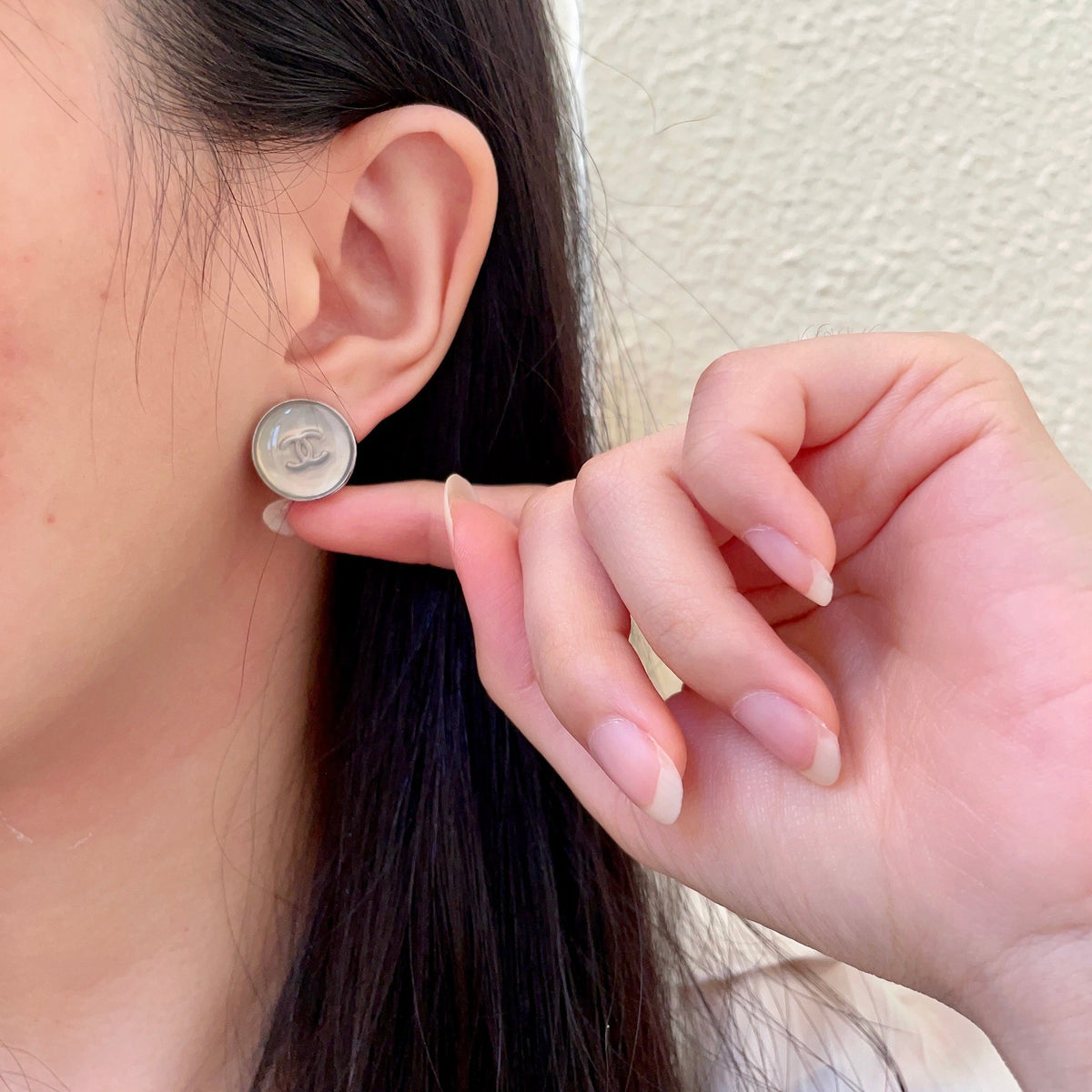 Double-C Emblem Stud Earrings in Polished Metal-Tone – Design 275 front product view