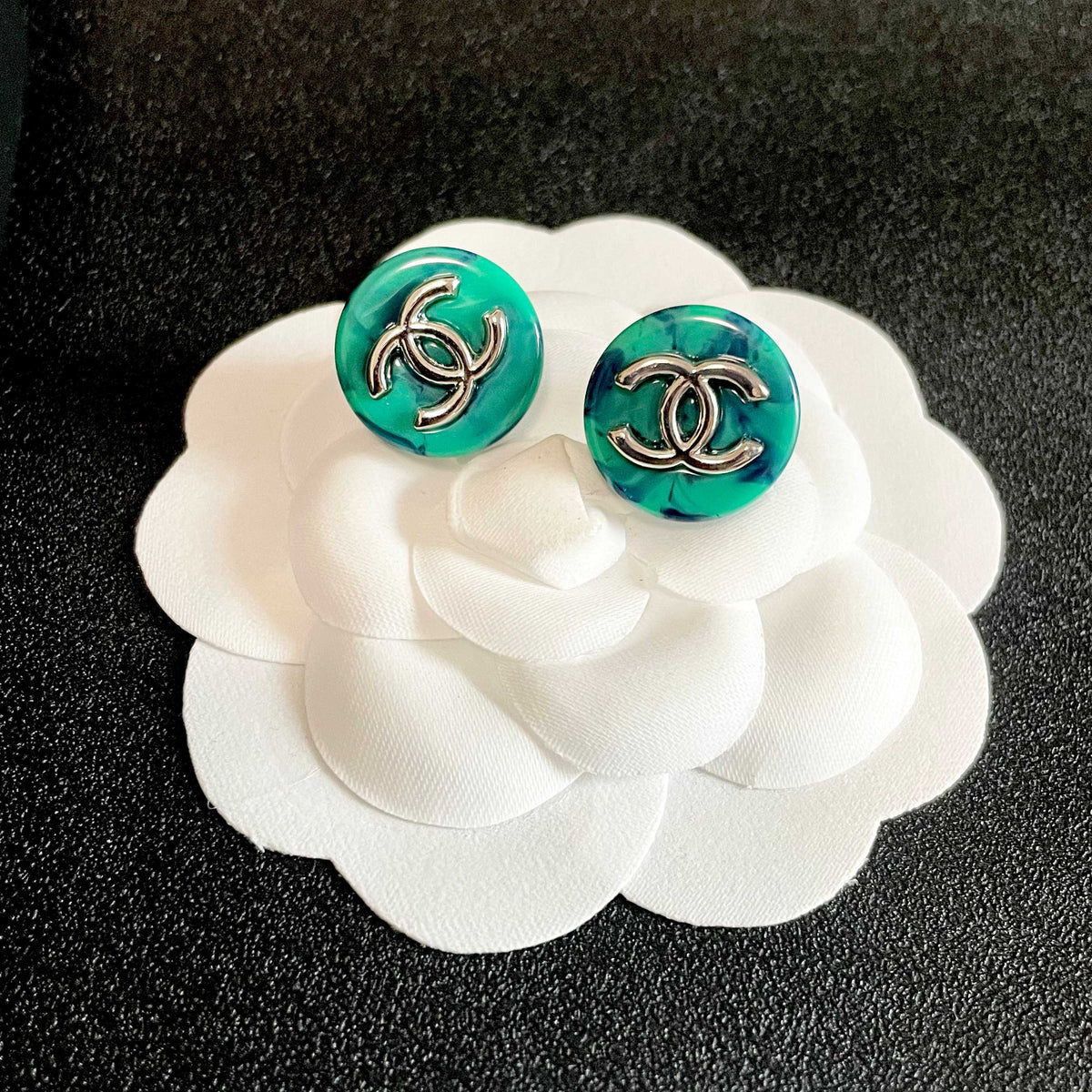 Double-C Emblem Stud Earrings in Polished Metal-Tone – Design 290 front product view