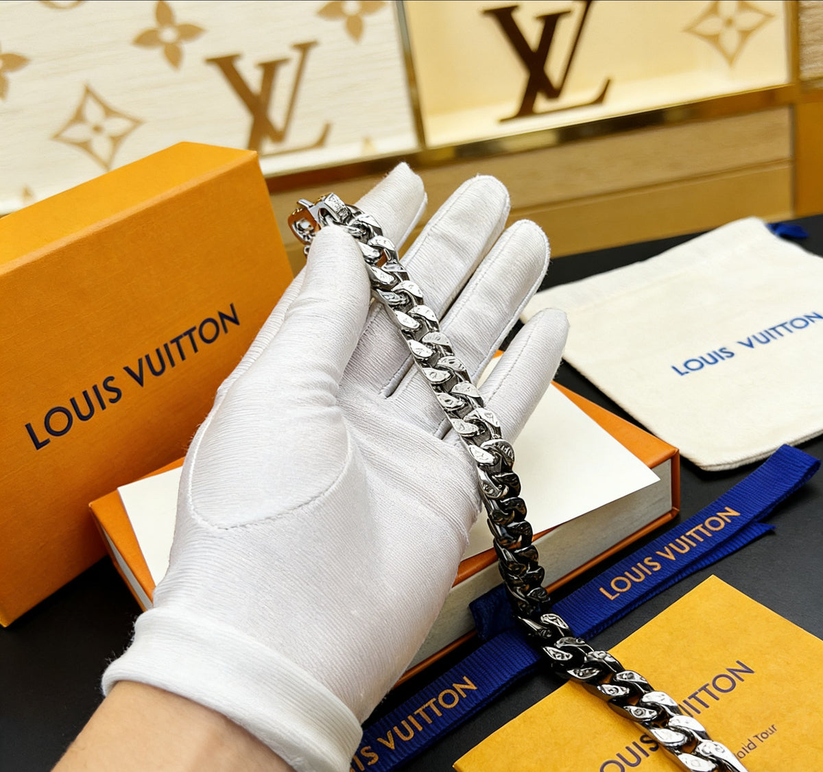 Signature Emblem Bracelet in Polished Metal-Tone – Black Detail close-up detail