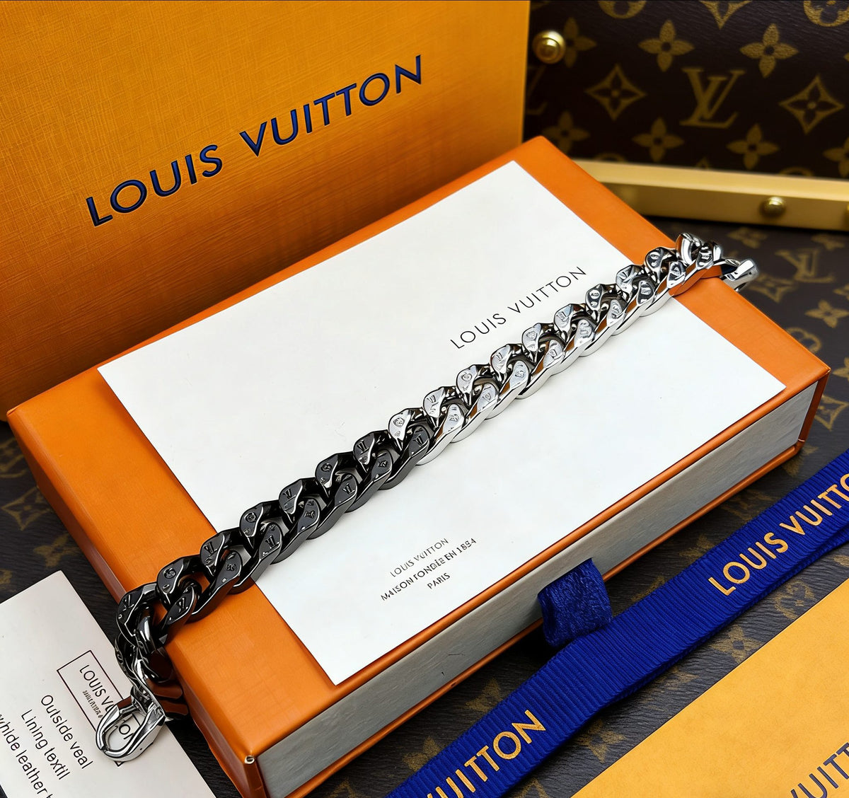 Signature Emblem Bracelet in Polished Metal-Tone – Black Detail styled product view