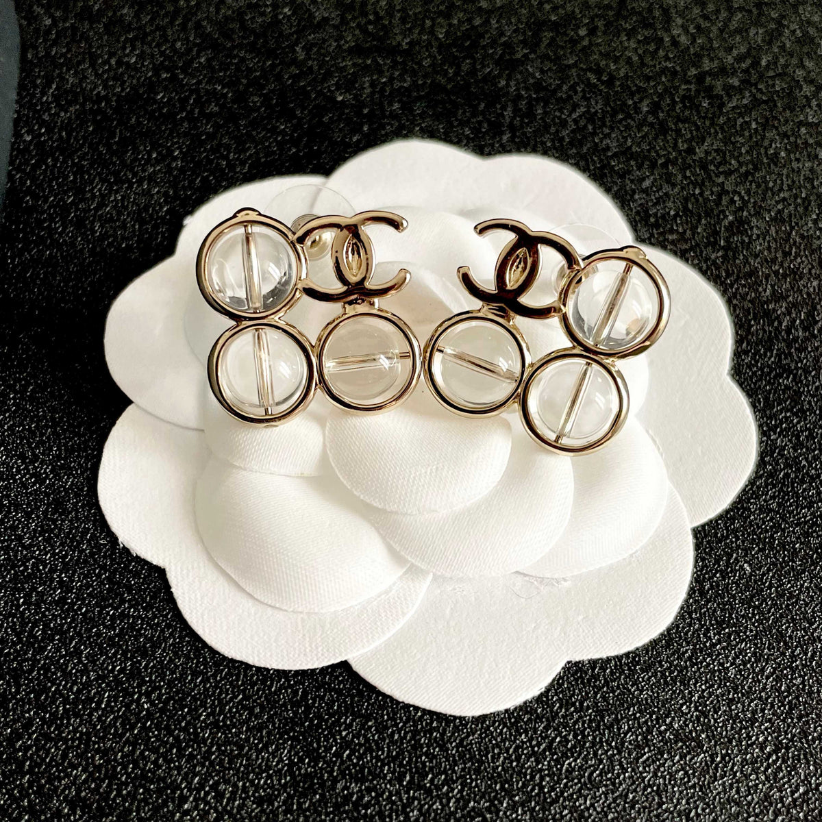 Double-C Emblem Stud Earrings in Polished Metal-Tone – Design 373 front product view