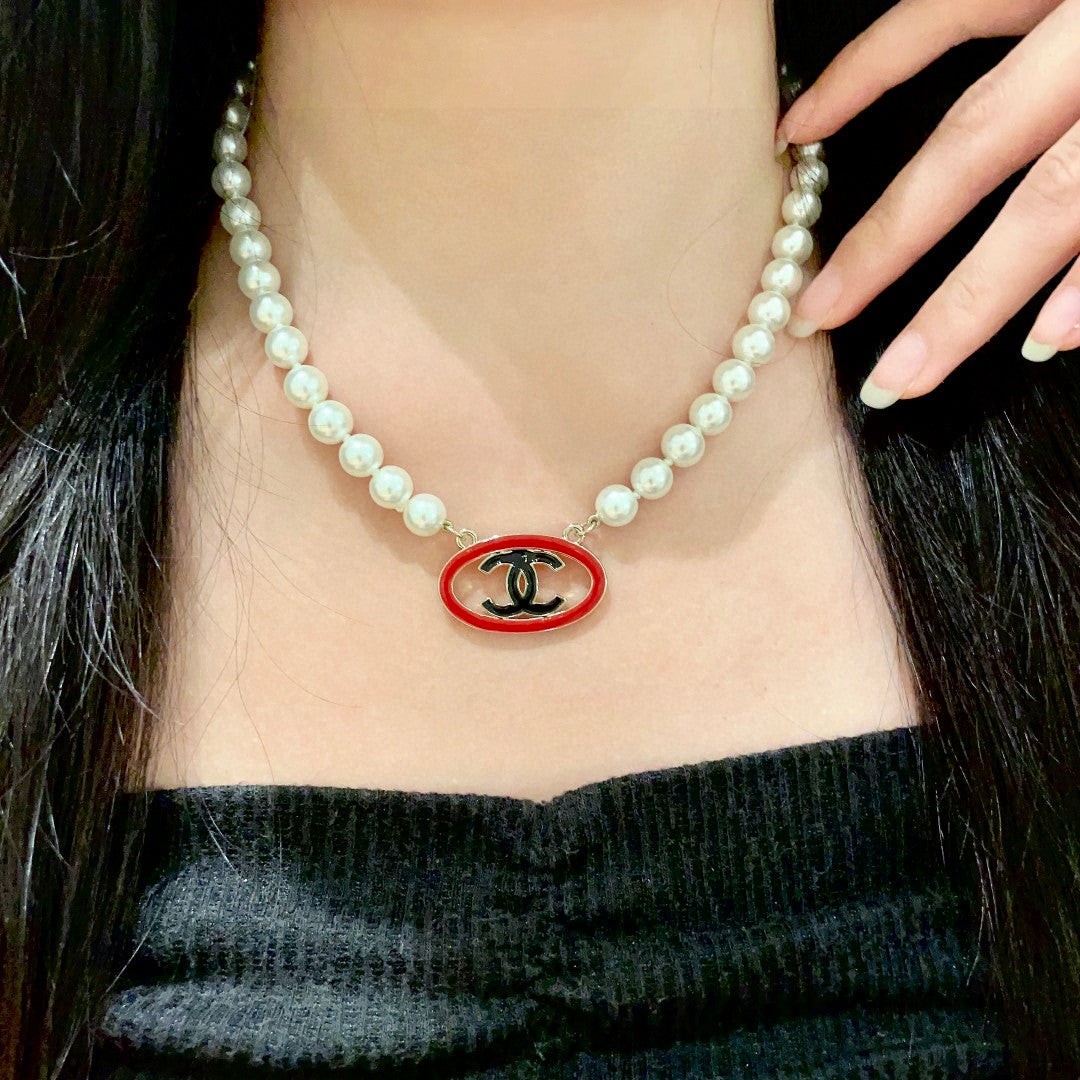 Double-C Emblem Pearl-Detail Pendant Necklace – Pearl Detail – Design 078 detail view