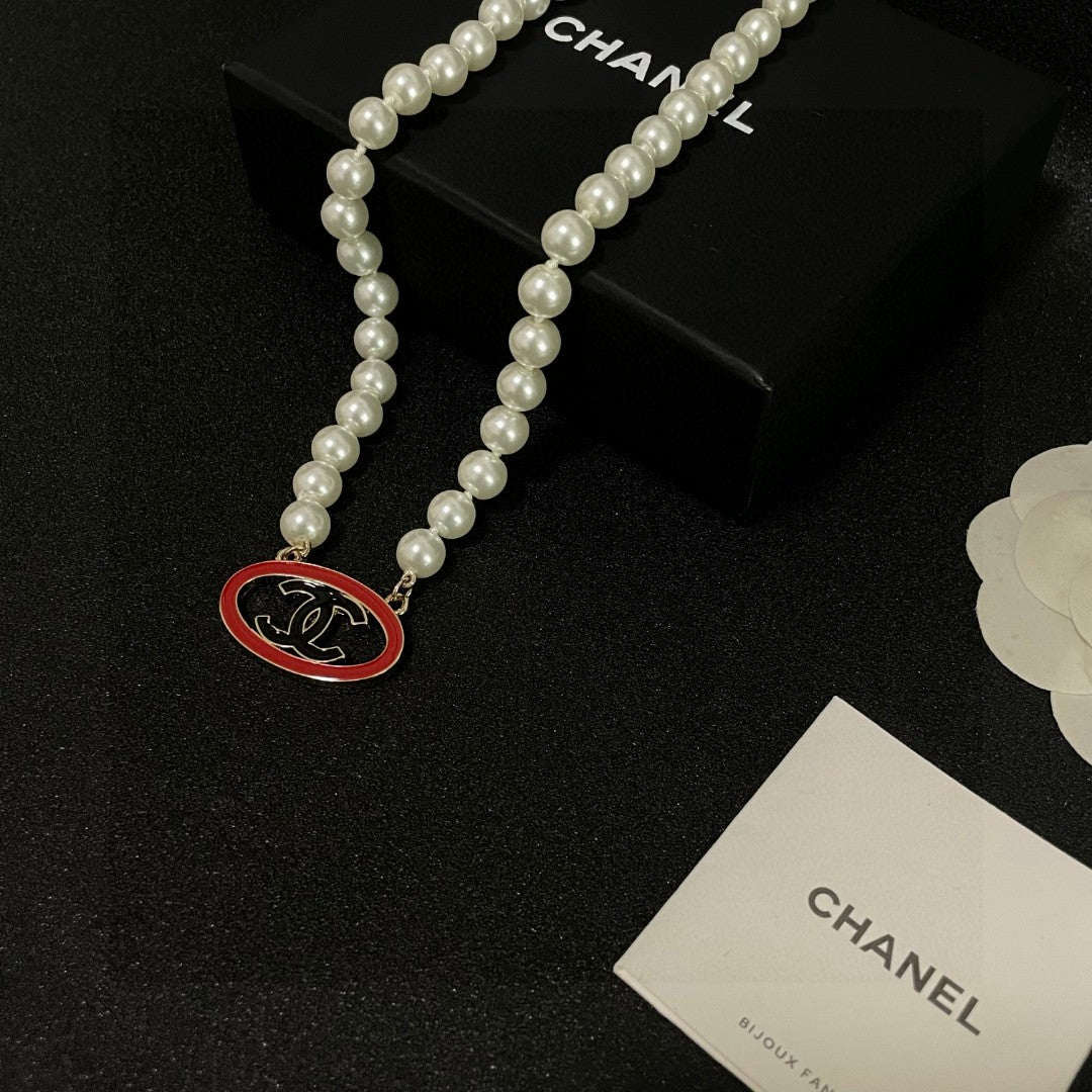 Double-C Emblem Pearl-Detail Pendant Necklace – Pearl Detail – Design 121 main product view