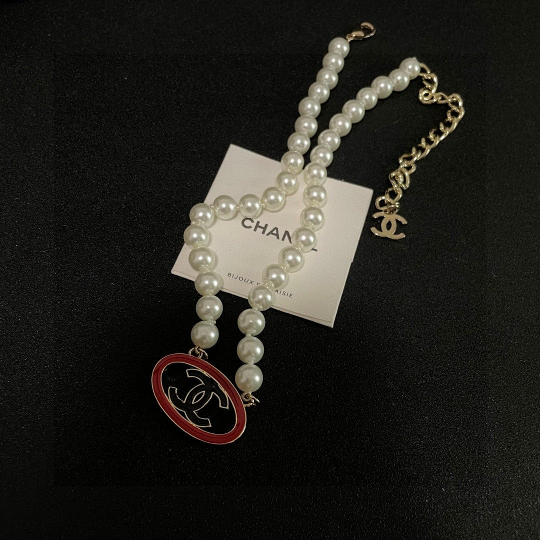 Double-C Emblem Pearl-Detail Pendant Necklace – Pearl Detail – Design 121 side detail