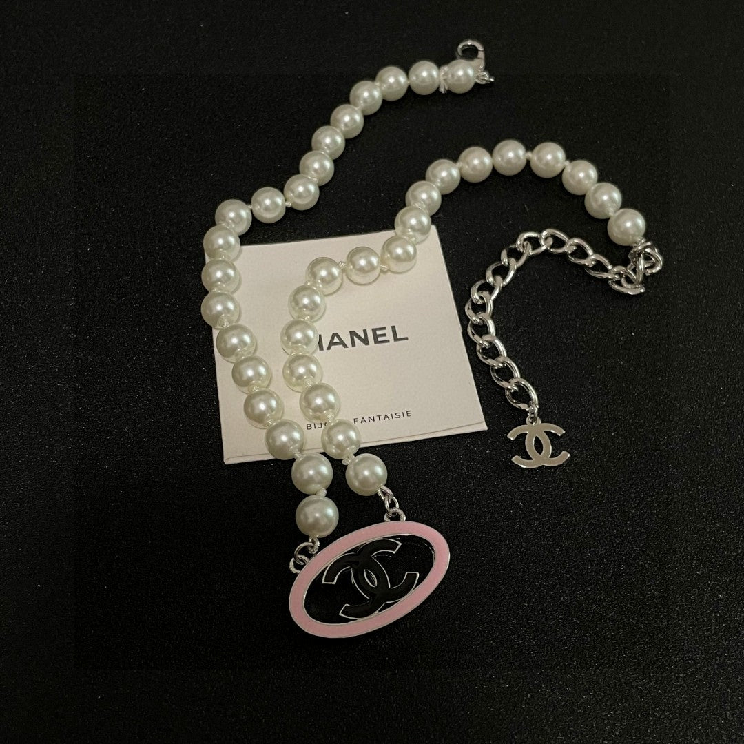 Double-C Emblem Pearl-Detail Pendant Necklace – Pearl Detail – Design 120 detail view