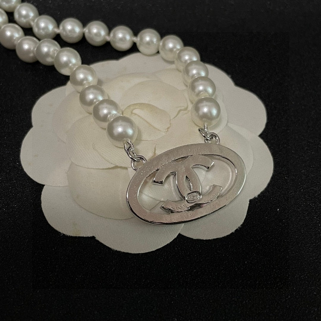 Double-C Emblem Pearl-Detail Pendant Necklace – Pearl Detail – Design 077 front product view