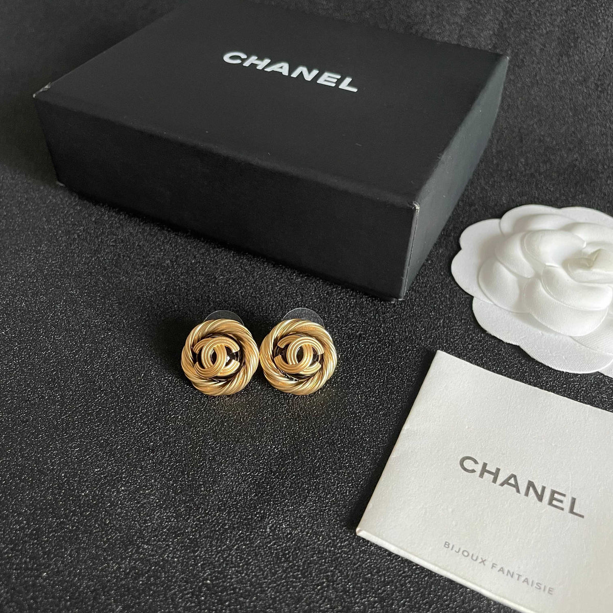 Double-C Emblem Stud Earrings in Polished Metal-Tone – Design 063 close-up detail