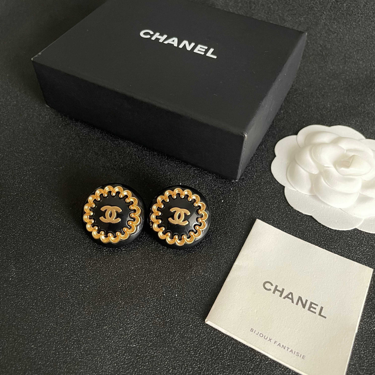 Double-C Emblem Stud Earrings in Polished Metal-Tone – Design 062 close-up detail