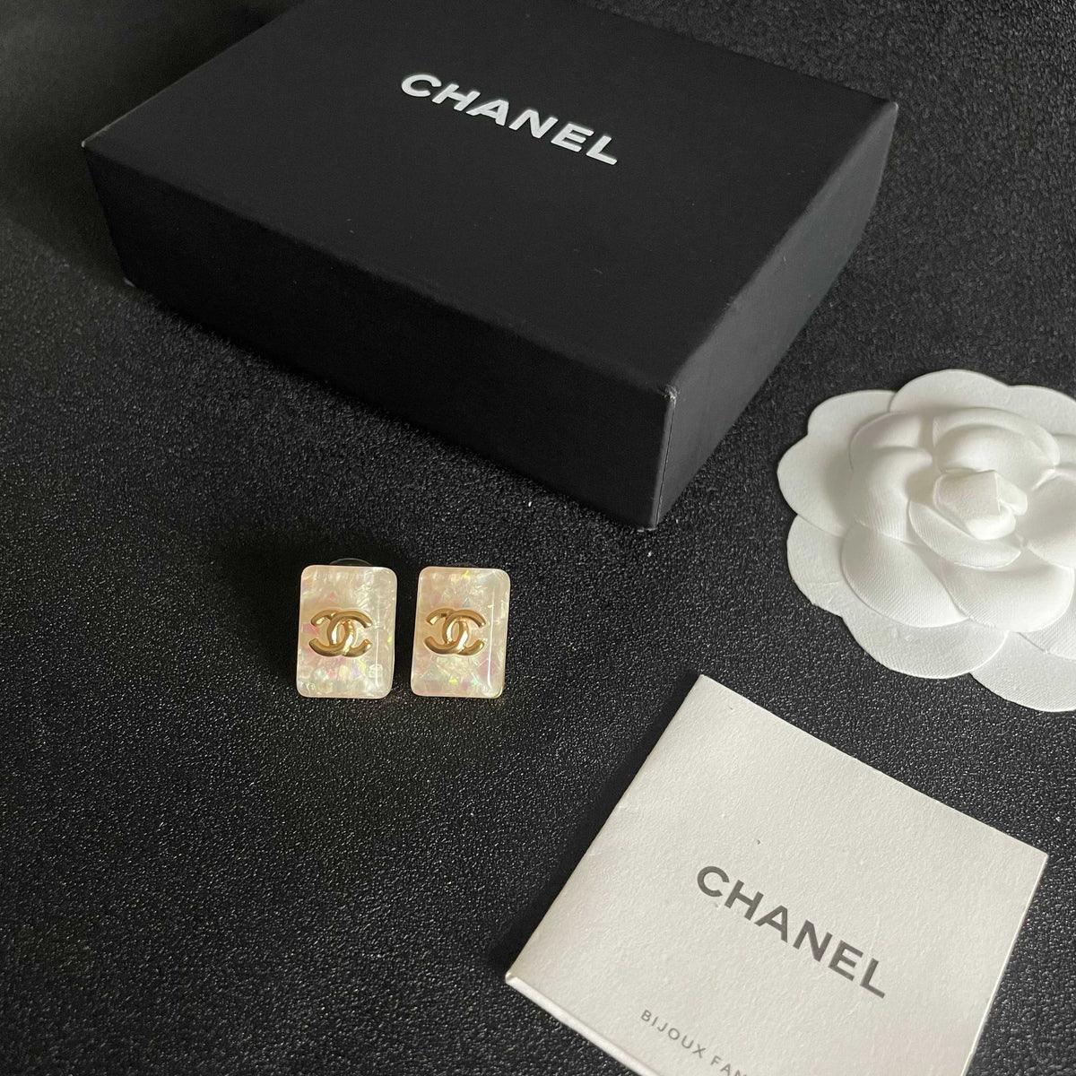 Double-C Emblem Stud Earrings in Polished Metal-Tone – Design 410 close-up detail