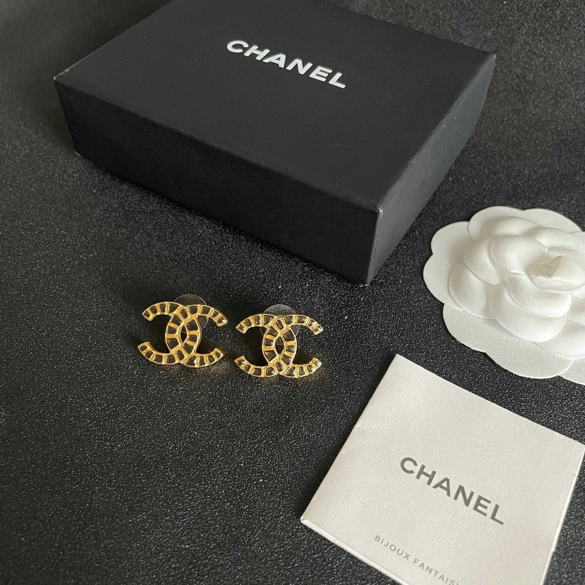 Double-C Emblem Stud Earrings in Polished Metal-Tone – Design 057 close-up detail