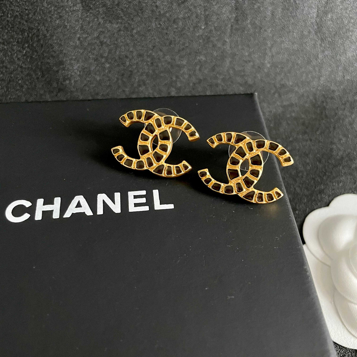 Double-C Emblem Stud Earrings in Polished Metal-Tone – Design 057 detail view