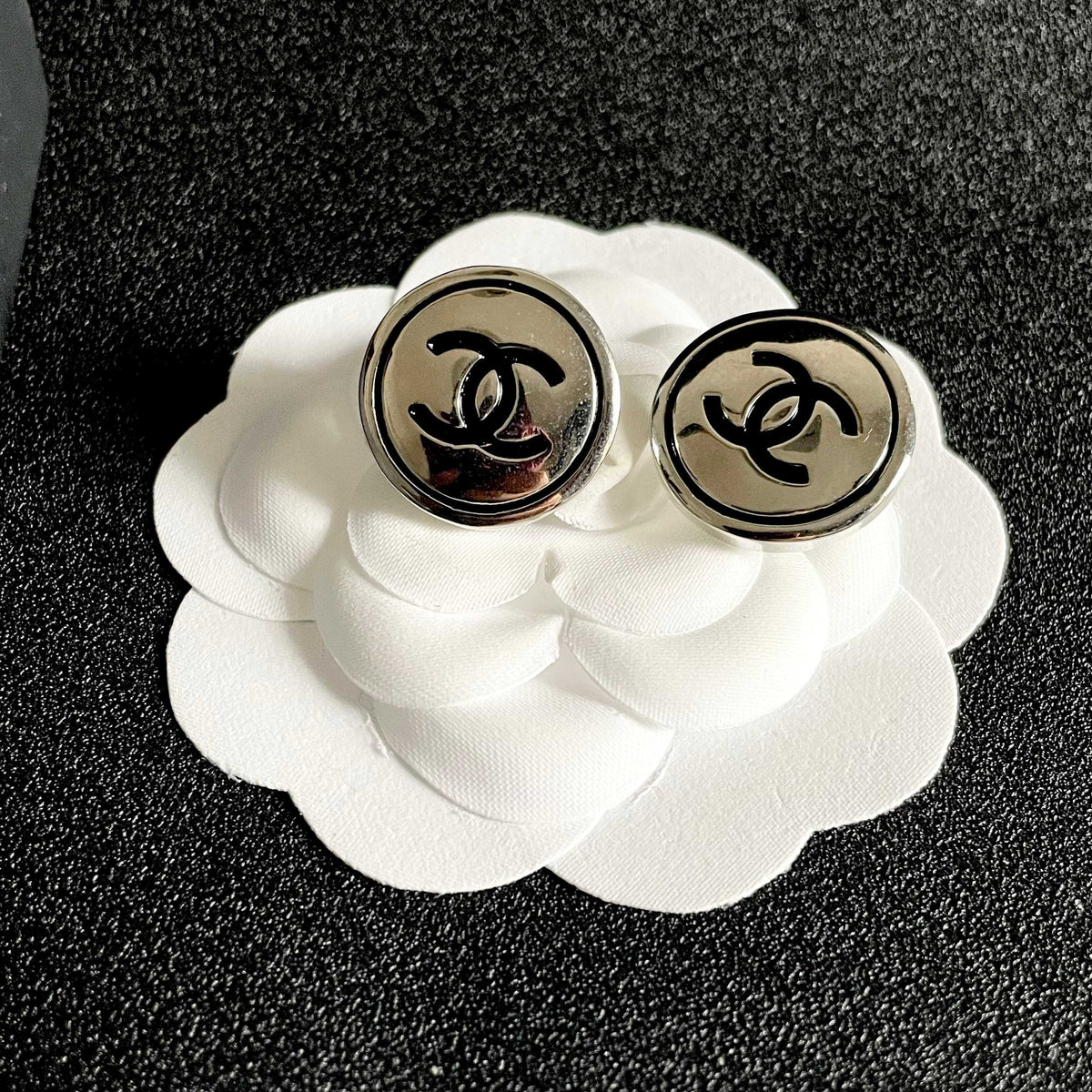 Double-C Emblem Stud Earrings in Polished Metal-Tone – Design 164 front product view