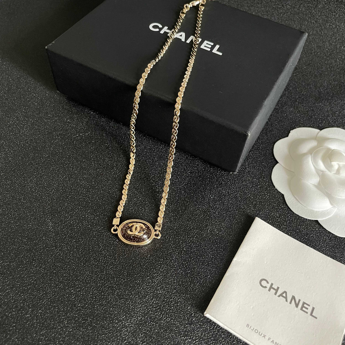 Double-C Emblem Pendant Necklace in Polished Metal-Tone – Design 013 close-up detail