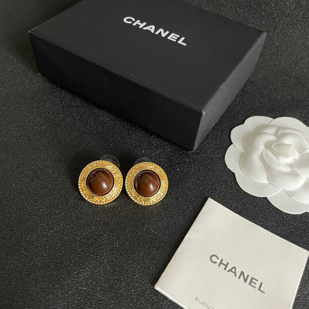 Double-C Emblem Stud Earrings in Polished Metal-Tone – Design 067 close-up detail