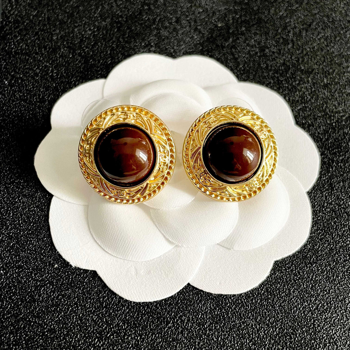 Double-C Emblem Stud Earrings in Polished Metal-Tone – Design 142 front product view