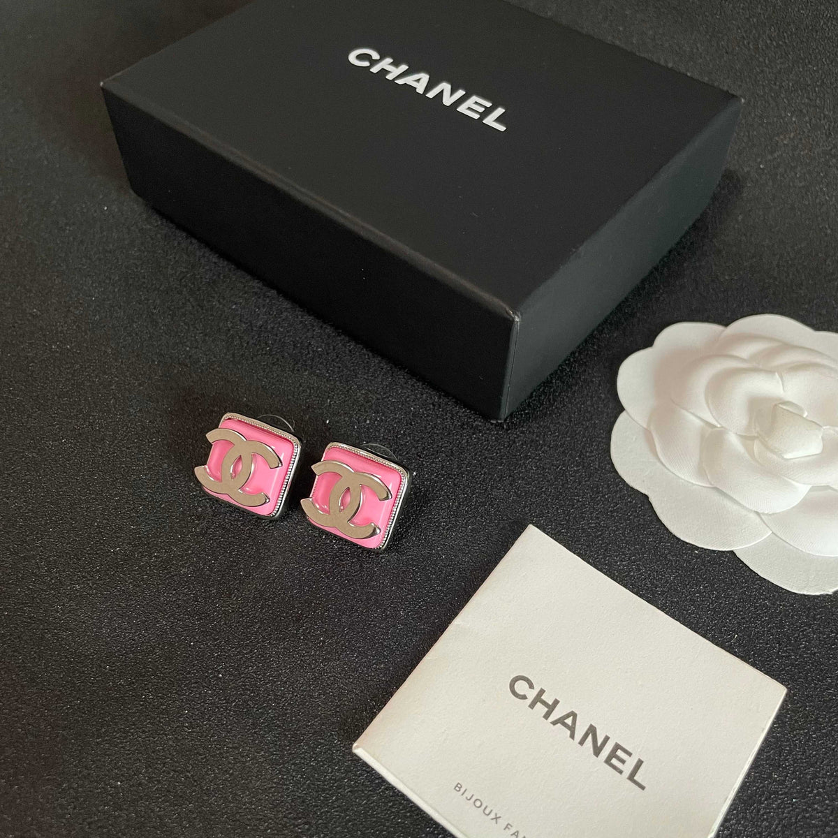 Double-C Emblem Stud Earrings in Polished Metal-Tone – Design 190 close-up detail