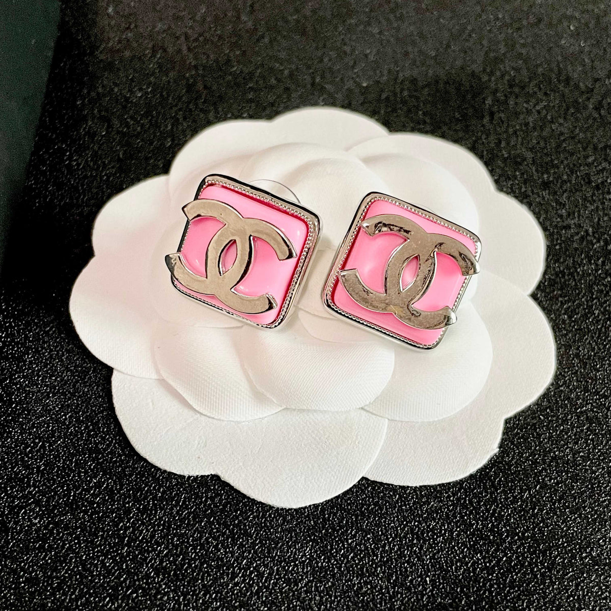 Double-C Emblem Stud Earrings in Polished Metal-Tone – Design 190 front product view