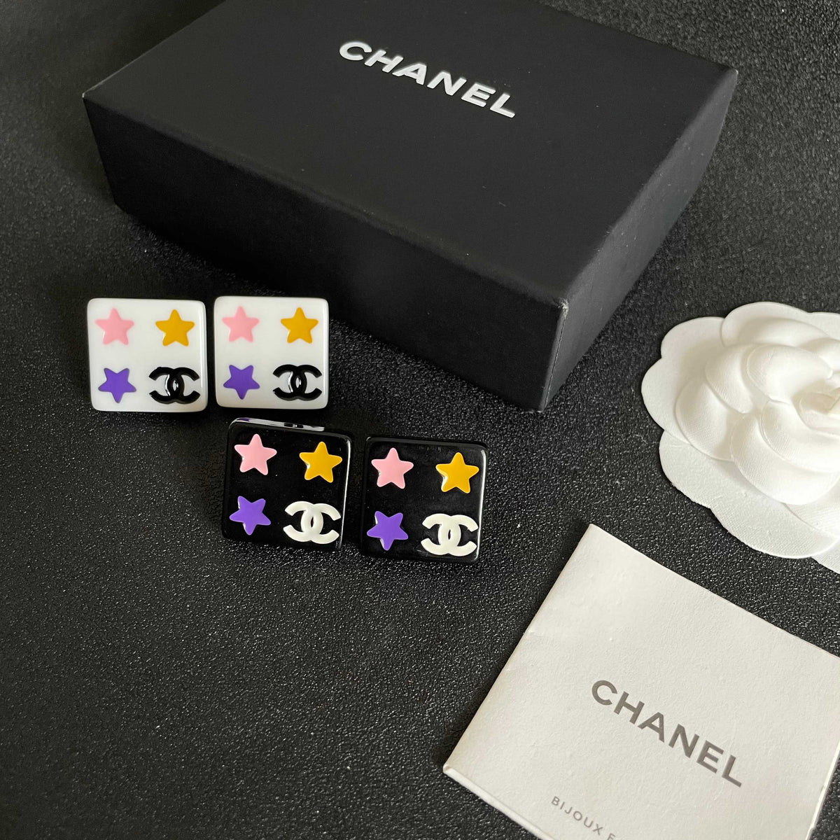 Double-C Emblem Stud Earrings in Polished Metal-Tone – Star Detail – Design 010 close-up detail