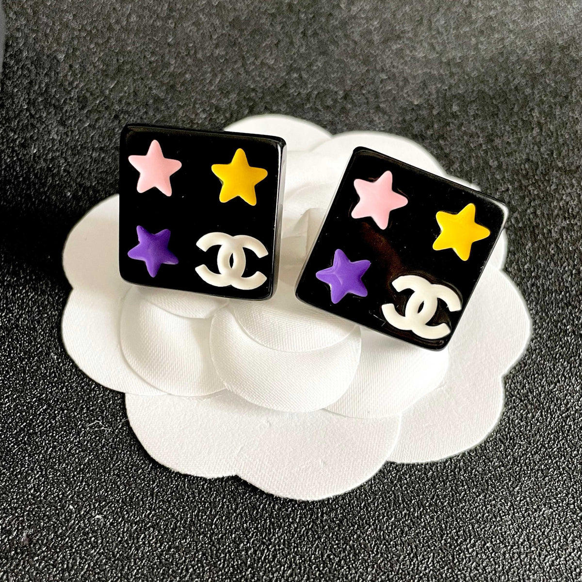 Double-C Emblem Stud Earrings in Polished Metal-Tone – Star Detail – Design 010 front product view