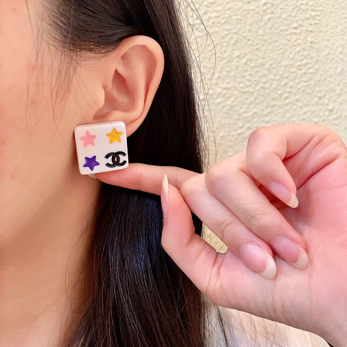 Double-C Emblem Stud Earrings in Polished Metal-Tone – Star Detail – Design 009 front product view