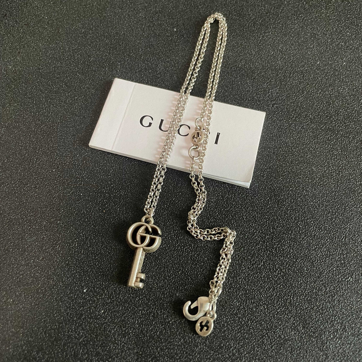 Double-G Emblem Pendant Necklace in Polished Metal-Tone – Design 113 detail view