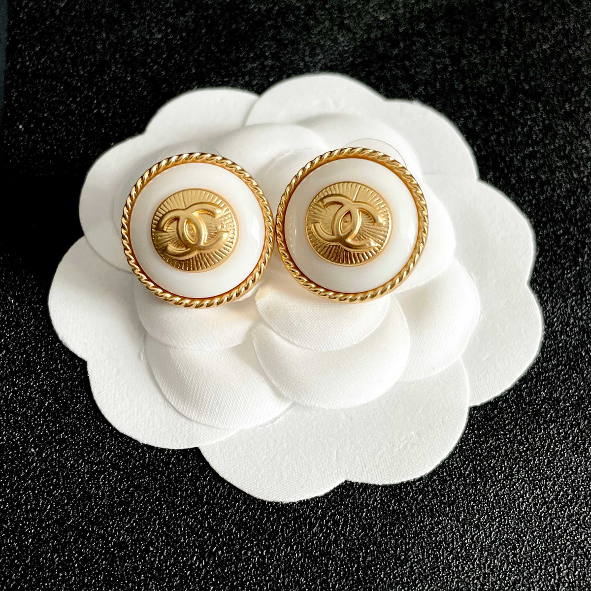 Double-C Emblem Stud Earrings in Polished Metal-Tone – Design 210 front product view