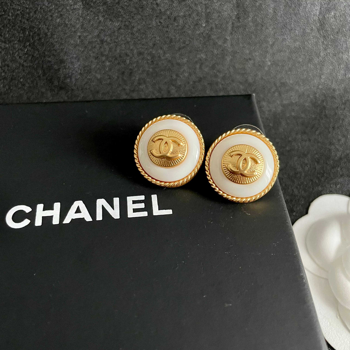 Double-C Emblem Stud Earrings in Polished Metal-Tone – Design 210 detail view