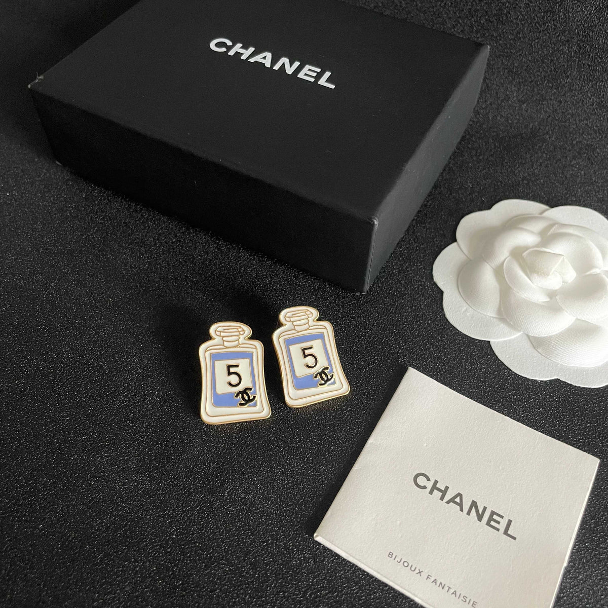 Double-C Emblem Stud Earrings in Polished Metal-Tone – Design 219 close-up detail