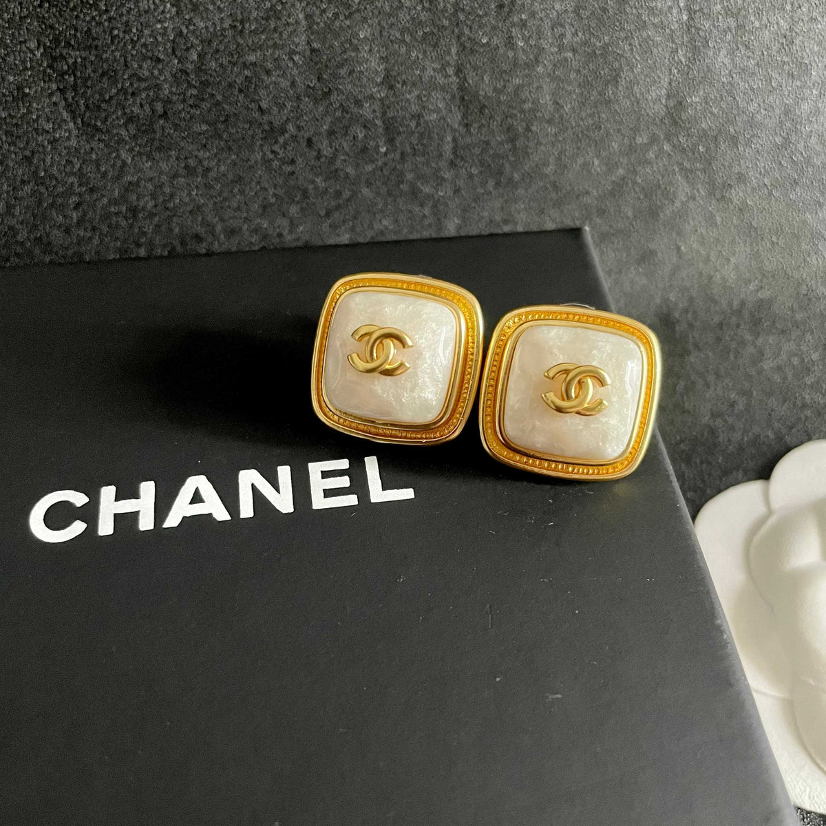 Double-C Emblem Stud Earrings in Polished Metal-Tone – Design 217 detail view